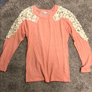 Coral/pink sweater with cutout sleeve